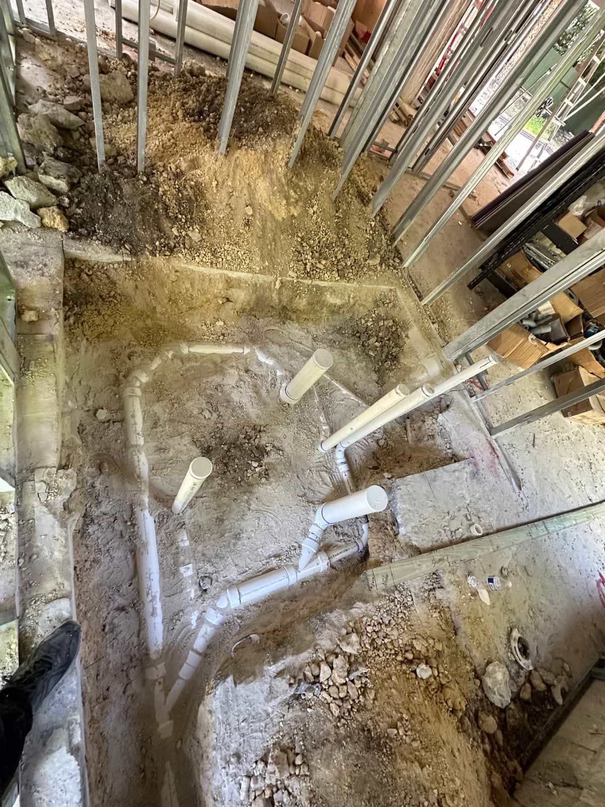 Before and after of a Underground pipe assemply by a plumber in Miami Lakes