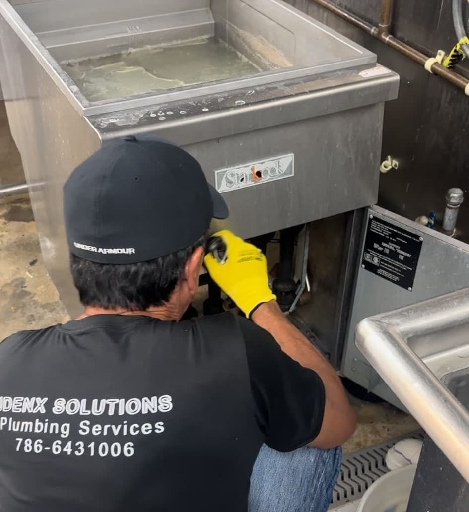Plumber in Miami Lakes working on a project
